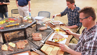 Illustration for article titled Everyone's the Grillmaster At this BBQ Picnic Table